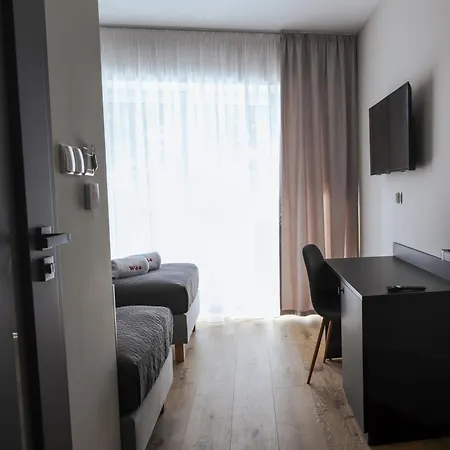 Aparthotel W64 Apartamenty